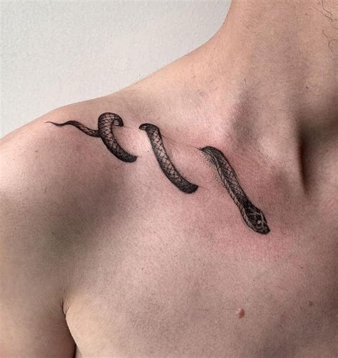 snake tattoo wrapped around body.